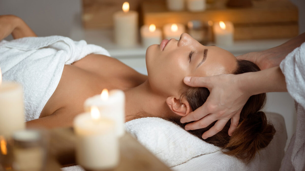 Luxurious spa day massage with candles