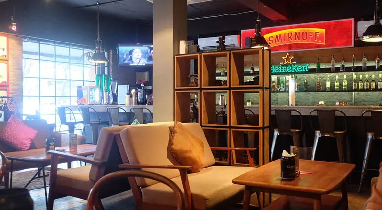 Cozy seating area inside District Bar Resto