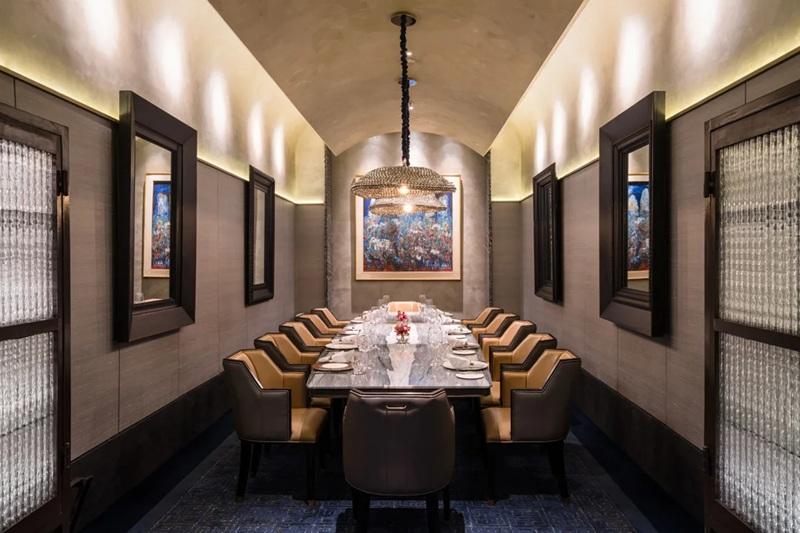 Elegant private dining room with long marble table
