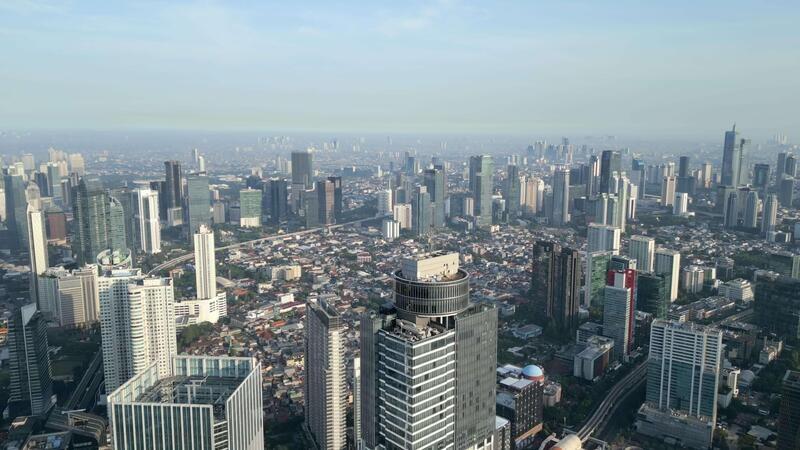 aerial view of modern city skyline with skyscrapers