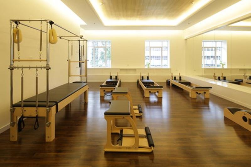 Pilates studio with reformers and Cadillac