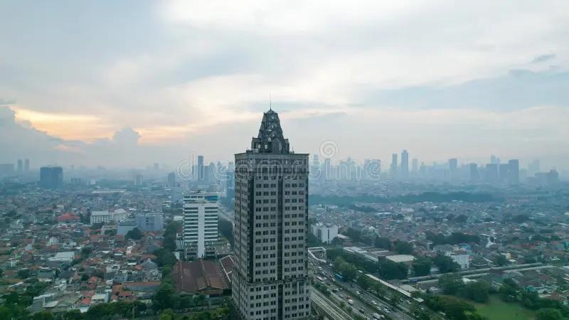 aerial view of tall building and urban skyline