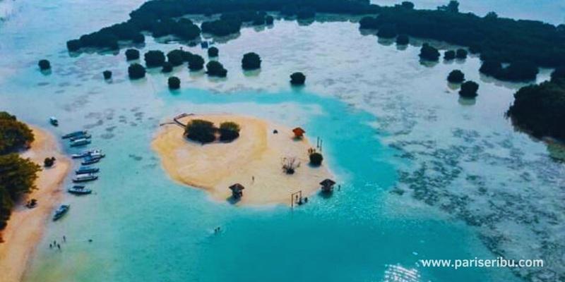 Aerial view of Pariseribu sandbar island and turquoise sea