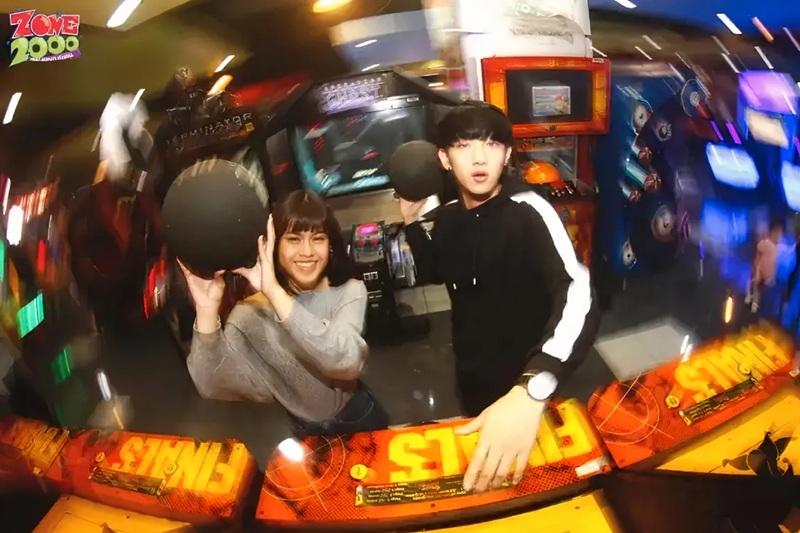 Zone 2000 logo, players at arcade basketball game