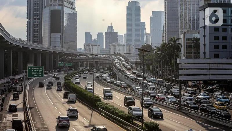 Busy city traffic on elevated highway with skyline