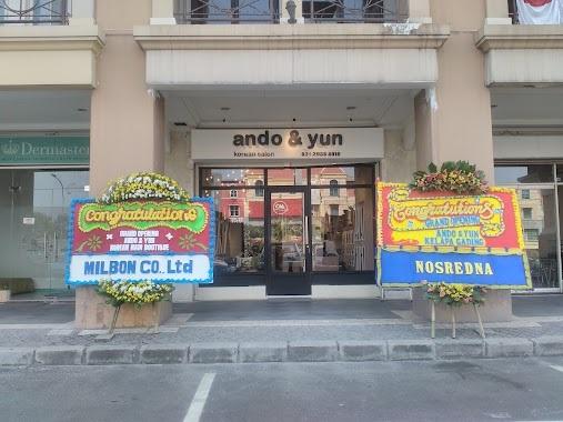 ando & yun salon logo with congratulatory floral boards