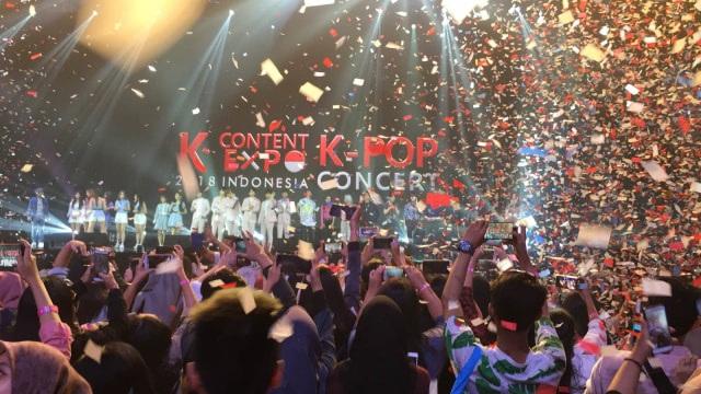 K-POP concert logo on stage with confetti