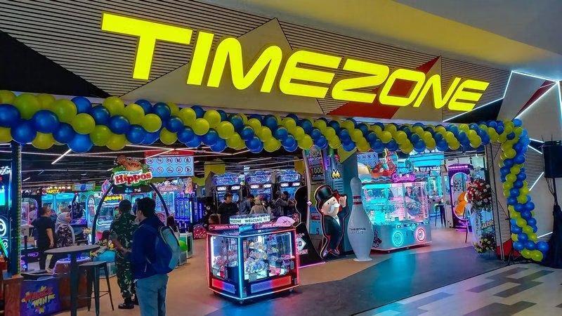 TIMEZONE logo arcade entrance decorated with balloons