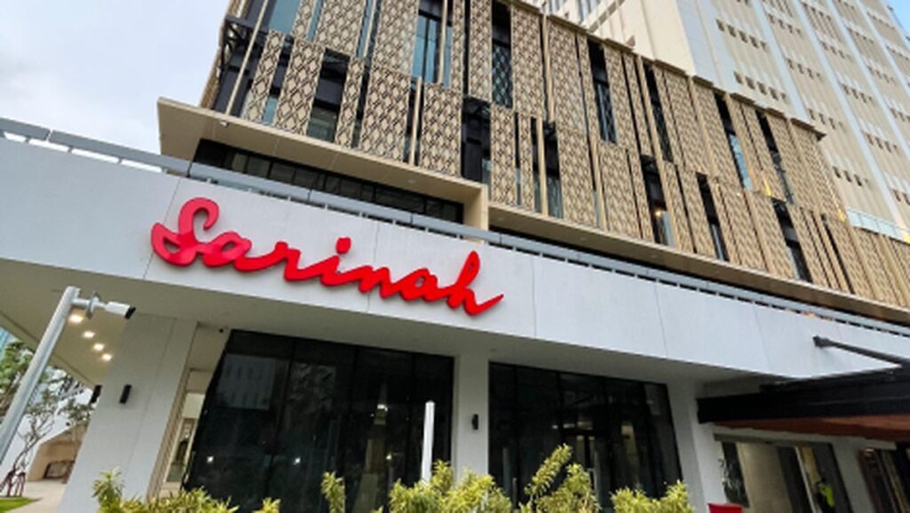 Building entrance with red Sarinah sign