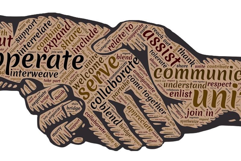 Handshake word cloud of cooperate and unity