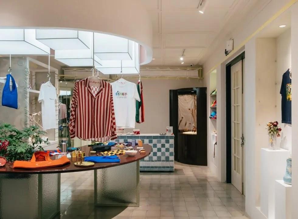 Boutique interior with striped shirt display