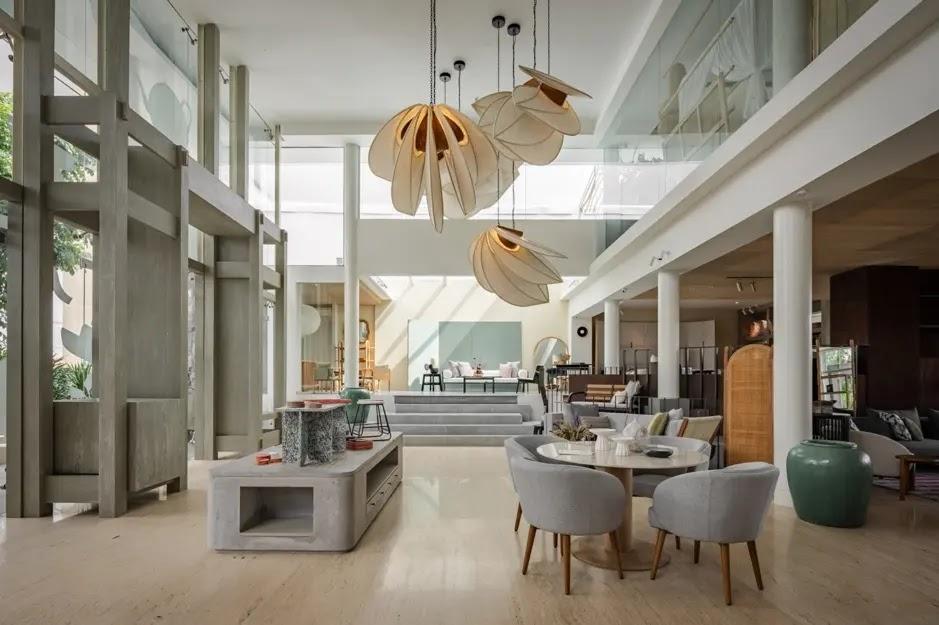 Spacious modern hotel lobby with pendant lights