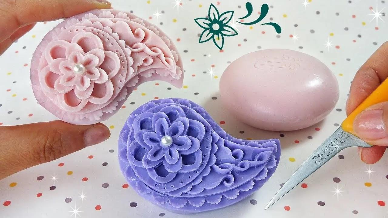 hand carved floral soaps in pink and purple