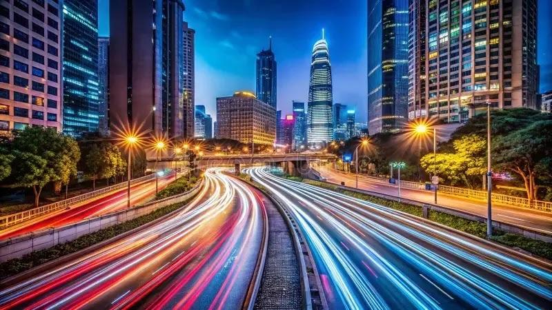 city highway at night with colorful light trails