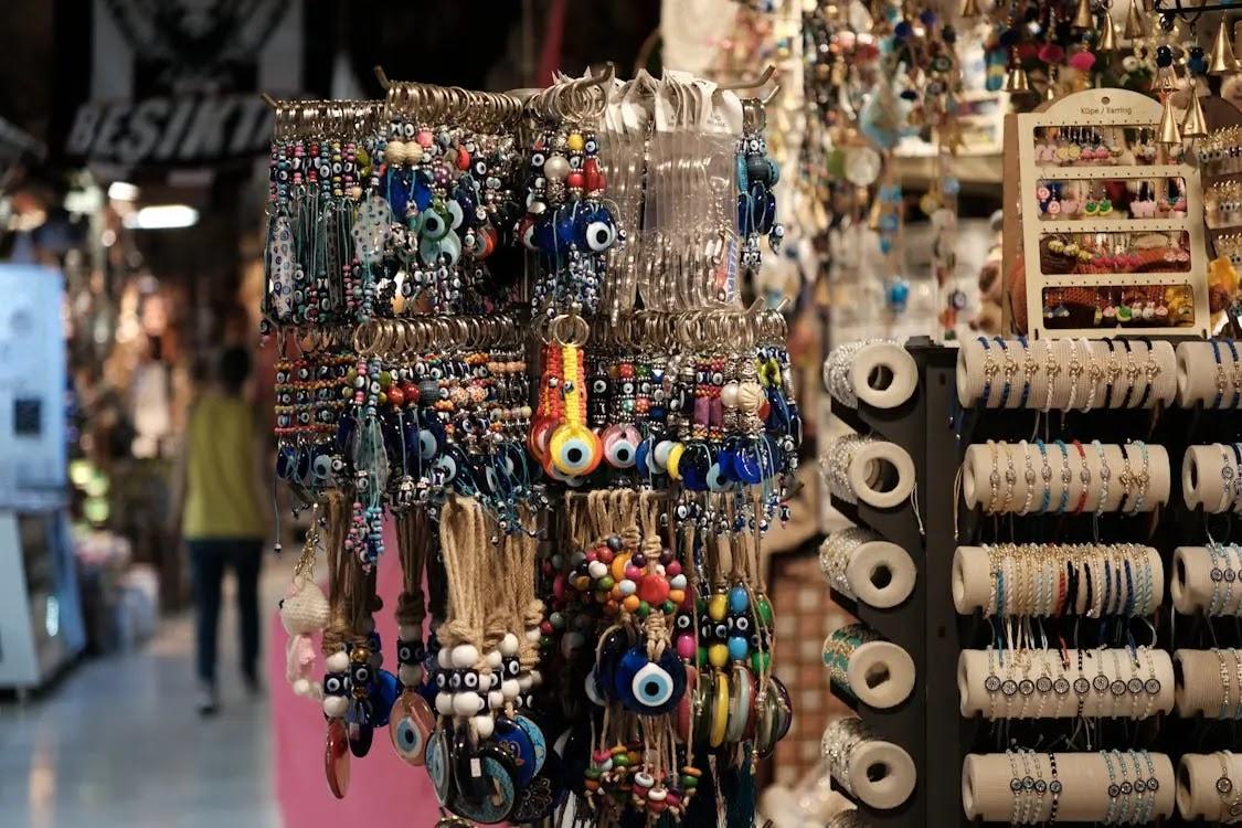 Colorful evil eye keychains and bracelets on display
