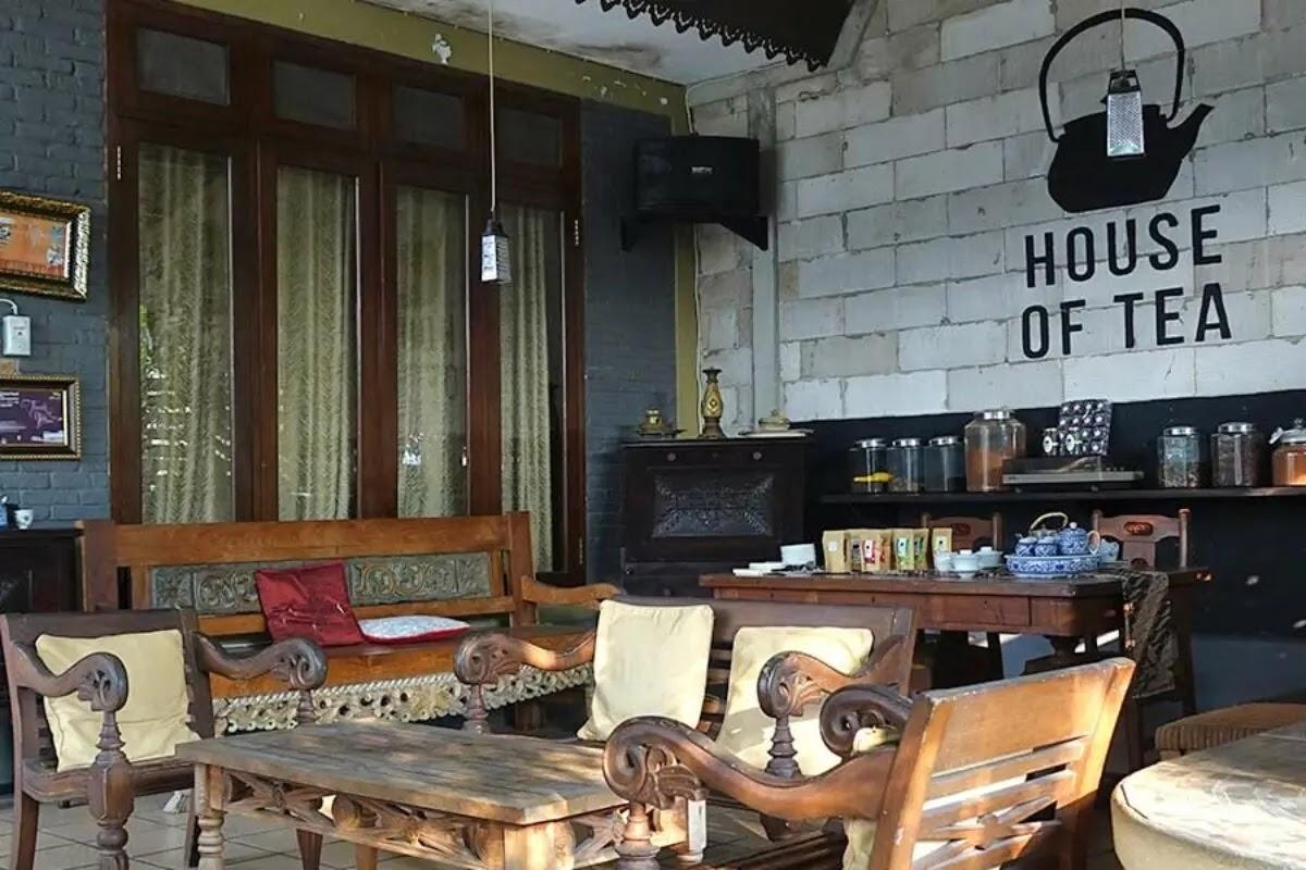 House of Tea logo on wall in rustic tea room