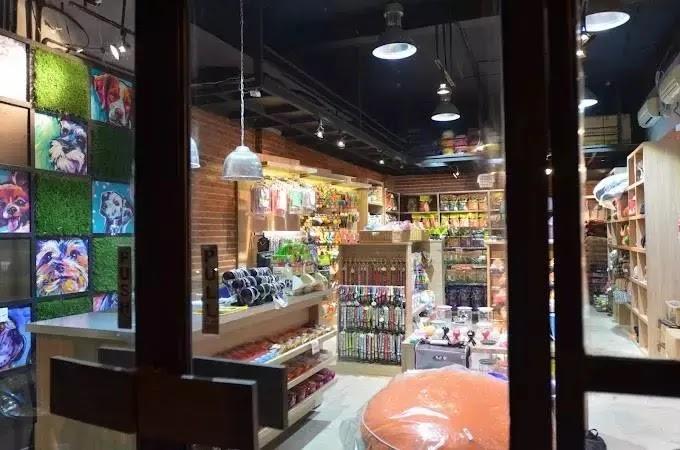 Pet store interior with shelves of pet supplies