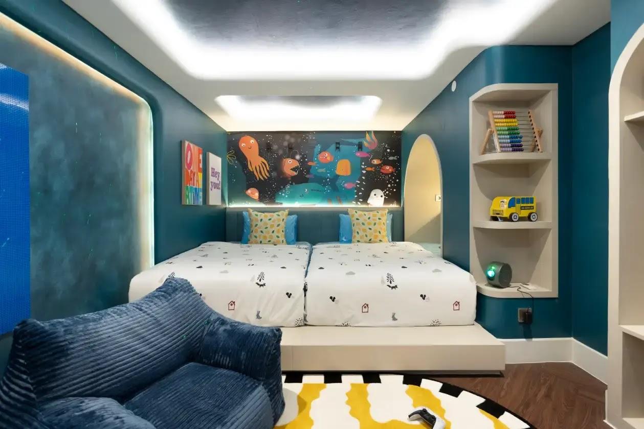 Kids ocean themed bedroom with twin beds