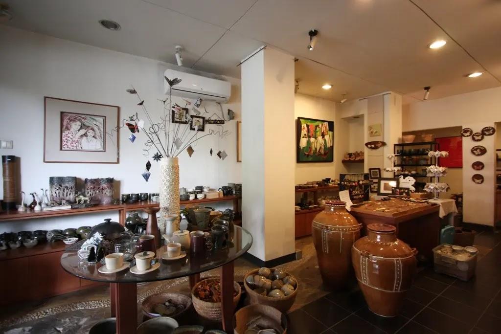Ceramic shop interior with pottery and large vases