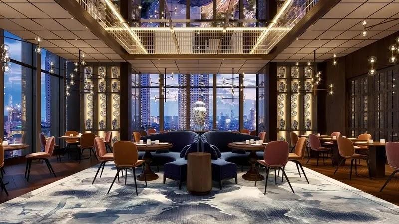 luxury hotel restaurant interior with city skyline view