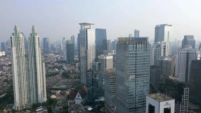 city skyline of modern glass skyscrapers