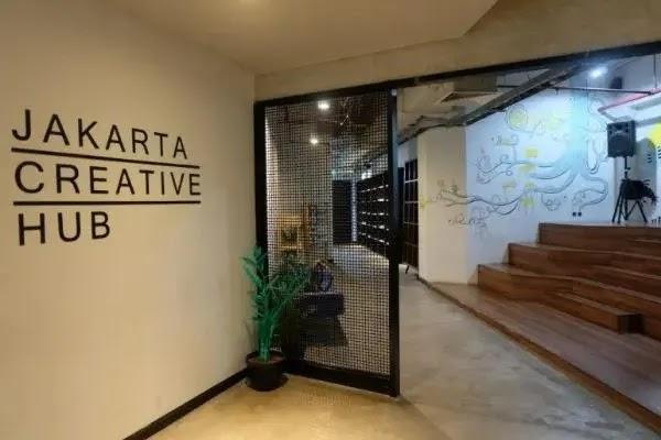 Jakarta Creative Hub logo on office entry wall