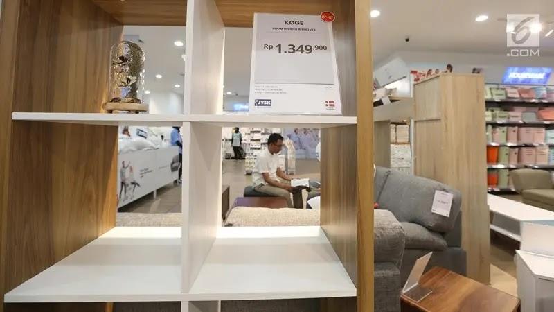 Wood and white cube shelving unit in furniture store