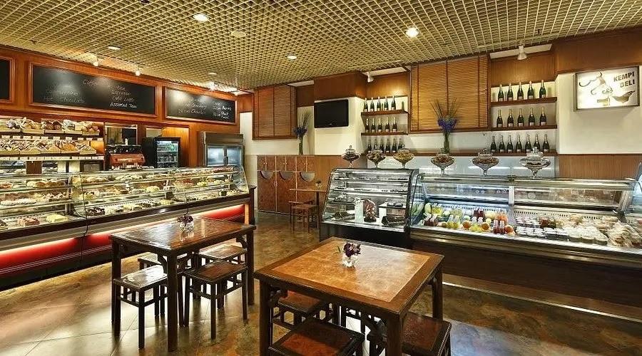 cozy deli bakery interior with glass display cases