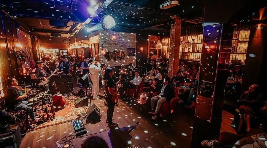 Live jazz club with band and seated audience