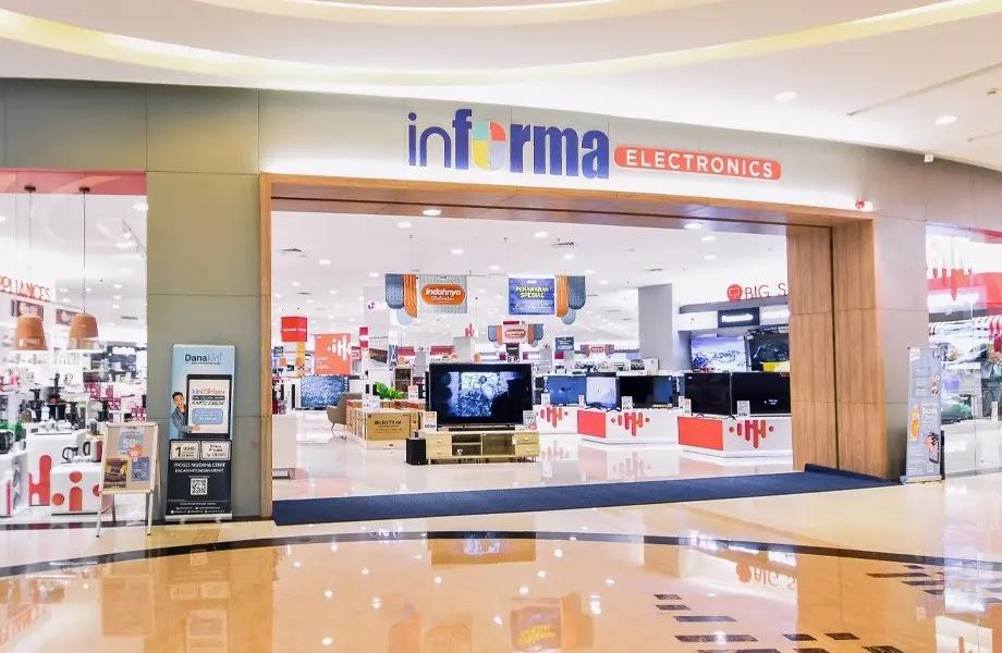 Informa Electronics store entrance with logo