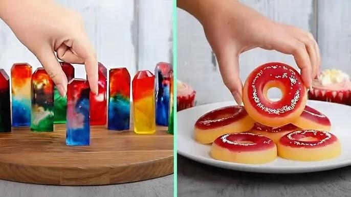 colorful gelatin desserts shaped like bars and donuts