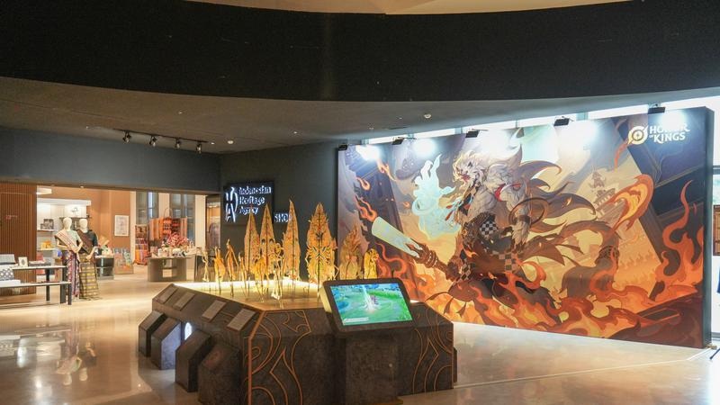 Game retail store display with glowing “Hoard of Kings” banner, fantasy mural, and interactive gaming kiosk