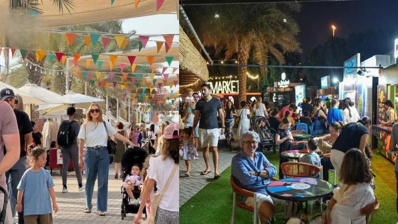 Outdoor market with food stalls, people dining at tables, and colorful bunting banners at night