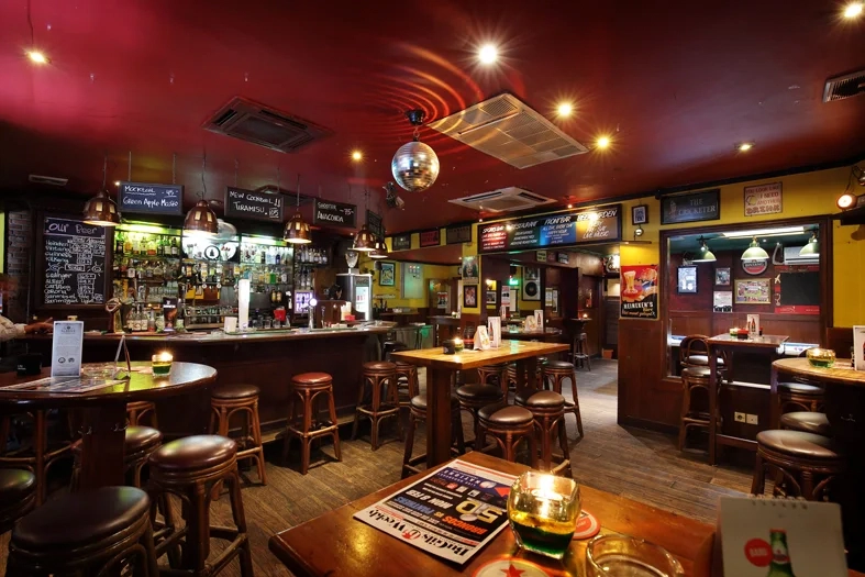 classic pub interior with bar counter and disco ball