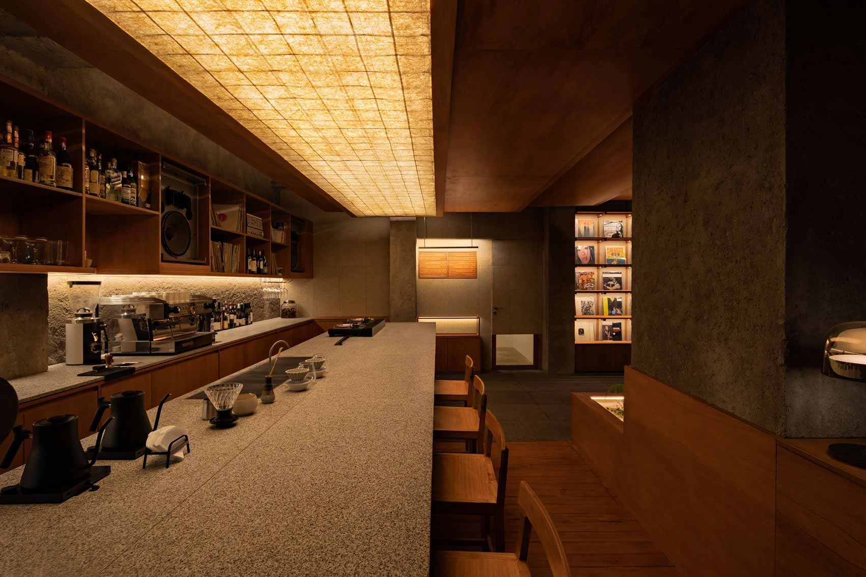 cozy japanese-style cafe counter with warm indirect lighting