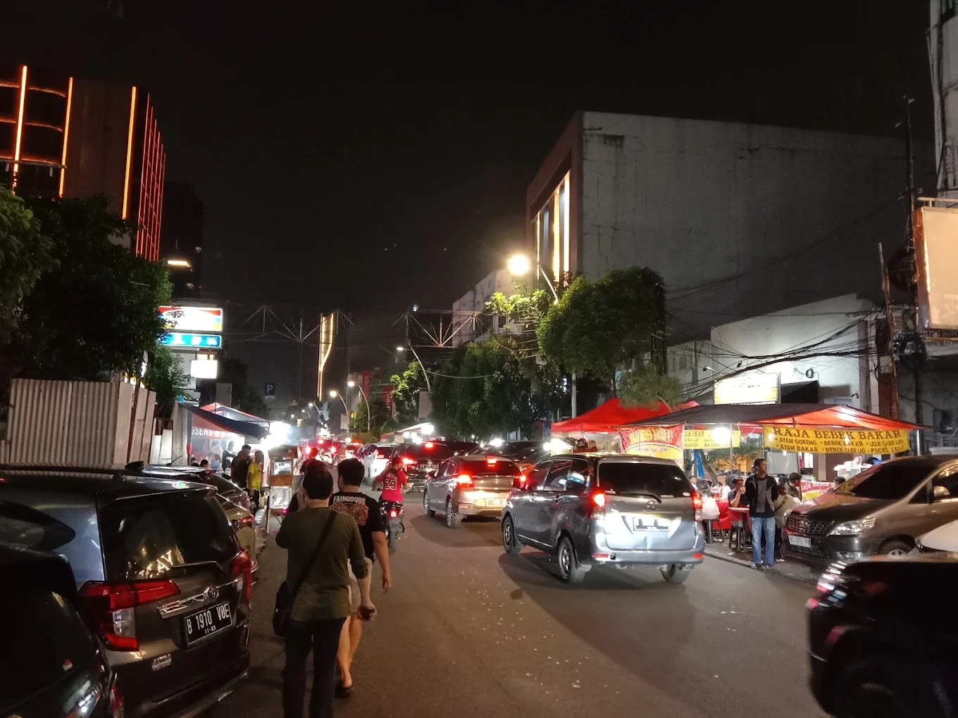 lively street food stalls along jalan sabang in jakarta at night