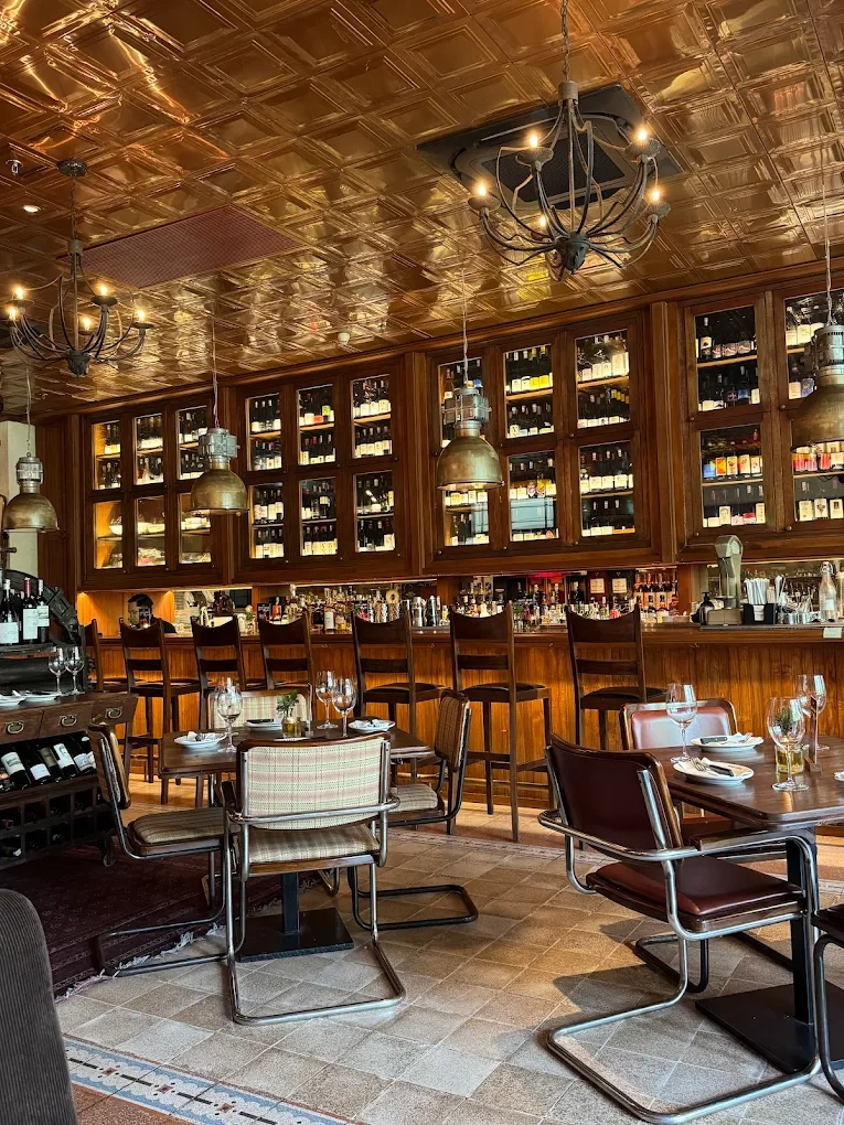 rustic bar with wooden wine cabinets and tables